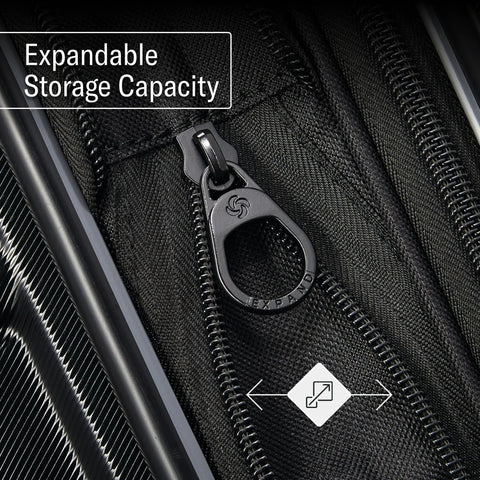 Close-up of Samsonite expandable luggage set zipper with expandable storage for enhanced packing capacity.