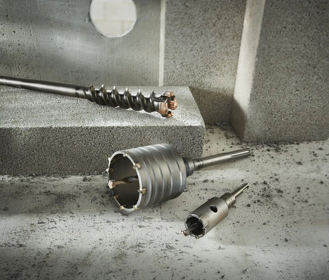 SDS-Max Rotary Hammer Core Bit With Wave Design Delivers Up To Forty Percent Faster Drilling, Carbide Tipped Bit with Concrete Blocks