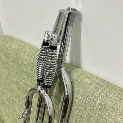 26 Inch Springer Fork For Cruiser Bicycles With Dual Spring Suspension, Chrome Finish, Steel Construction, Close-up View