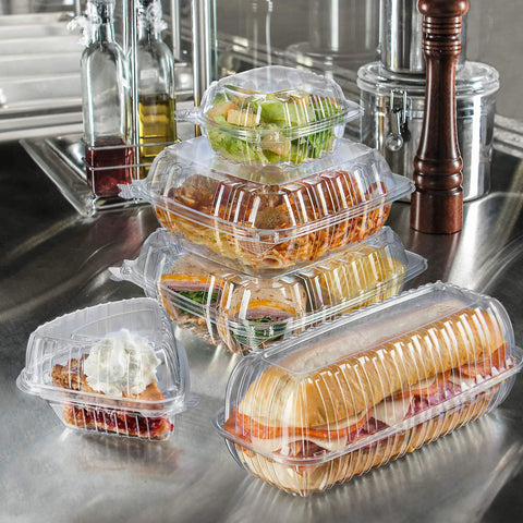 Clear Hinged Plastic Food Containers With Tight Seal Lids Leak Proof Takeout Trays Bulk Restaurant Packs 6 By 5 Point 8 Inches stacked with various meals.