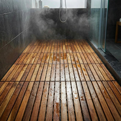 Wet wooden floor with steam, featuring EZ-Floor Interlocking Teak Flooring Tiles With Solid Teak Wood Oil Finish Long Slat Set Of 10.