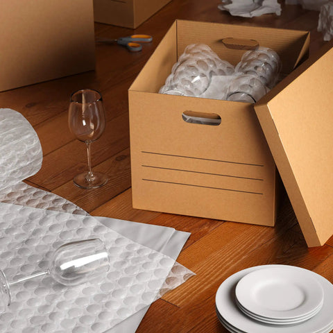 Straight Up Reliable Medium Packing Boxes With No Drama Lift Off Lids And Double Bottom Corrugated Cardboard Storage Containers For Chill Moving Days Pack Of Ten holding wine glasses and plates.