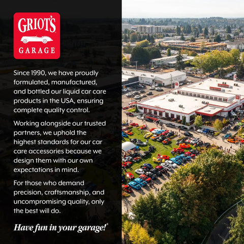 Aerial view of Griot's Garage parking lot with classic cars displayed next to a large store building surrounded by trees.