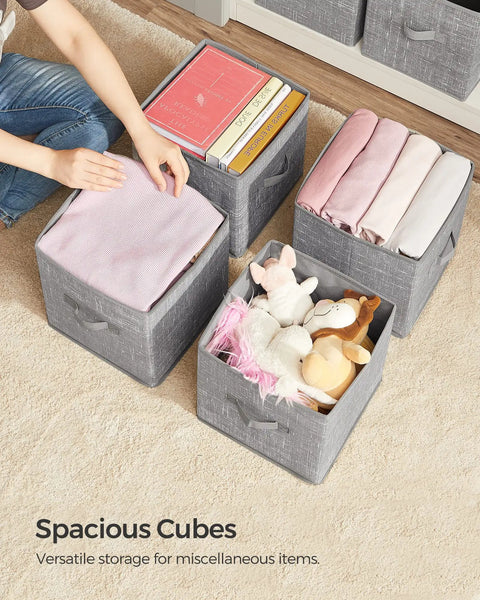 Rock Solid Foldable Storage Cubes Set Of 6, Durable 11 Inch closet organizers with reinforced handles, storing blankets and toys.