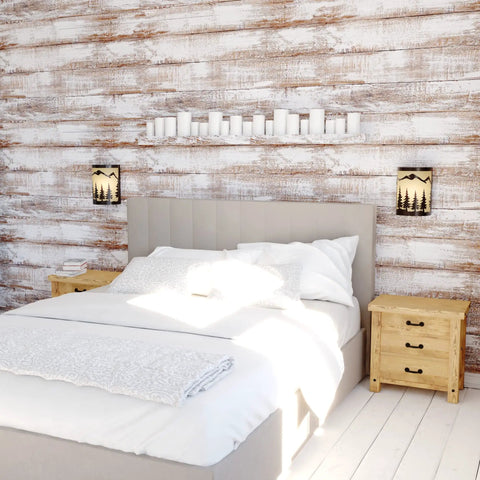 Rustic Tree Sconce Wall Light With Amber Flake Glass, dimmable, flanking a bed in a cozy room with wood-paneled walls.