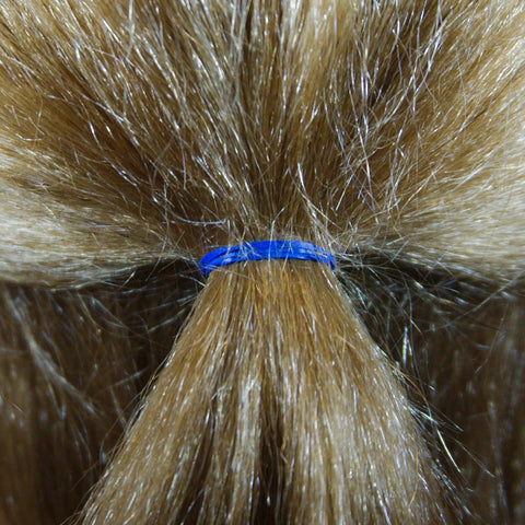 Dope Half Inch Rainbow Mix Small Rubber Bands For Hair Pack 500 Count Mini Elastic holders securing a ponytail with a blue rubber band.