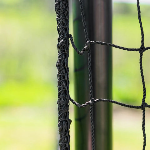 Close-up of Ultimate Baseball Batting Cage System with durable netting and sturdy black frame, part of home practice kit for hitters.