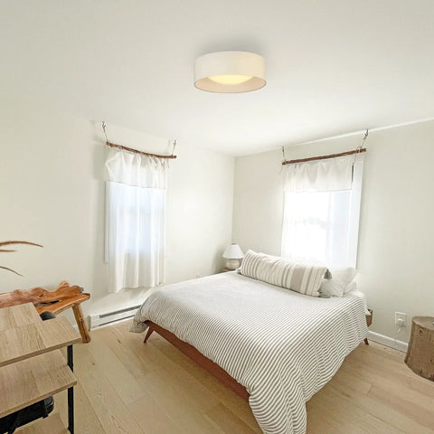 Orme 12 Inch Flush Mount LED Ceiling Light Fixture Dimmable White for Living Room, Bedroom, Hallway, Modern Close To Ceiling Design, Bright Energy Efficient Illumination in a bedroom setting