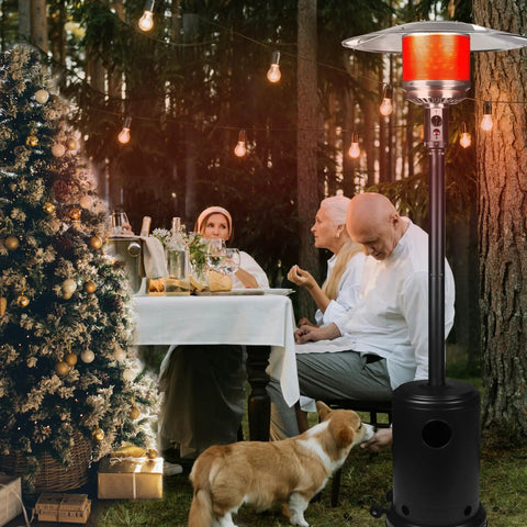 Powerful 50,000 BTU Propane Patio Heater On Wheels For Backyard Hangouts And Outdoor Dining next to outdoor dining table