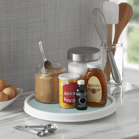 12 Inch Lazy Susan Turntable Organizer Featuring Slick Spinning Heavy Duty Ball Bearings And Nonskid Base For Kitchen Pantry Bathroom Cabinet And Craft Room Storage Tray To Keep Your Setup Tight with jars of honey, baking powder, and vanilla extract.