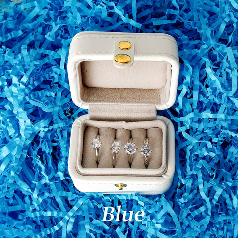 Top Shelf White Crinkle Paper Shreds And Gift Basket Filler No Brainer Cushioning Material For Shipping Boxes And Crafts, with rings in a box.