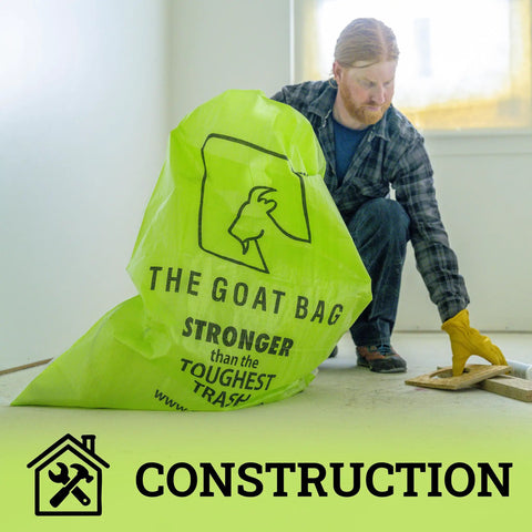 Ultimate Heavy Hitter Contractor Bags Built Like A Tank For Renovation Debris And Yard Waste 42 Gallon Tear Resistant Polypropylene Reusable Jobsite Trash Bags 10 Pack in use at a construction site.