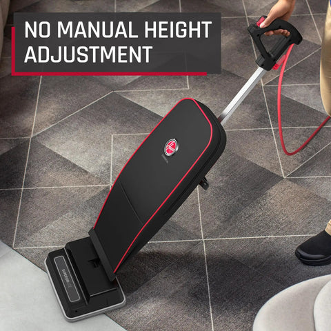 Hoover Commercial Superior Lite Upright Vacuum Cleaner Lightweight at Nine Pounds With Forty Foot Cord For Deep Carpet Cleaning And Powering Through Toughest Messes In Offices Or Small Shops Easy Maneuvering Design positioned on a modern tiled floor.