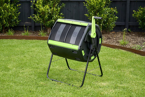 48 Gallon Geared Dual Chamber Compost Tumbler With Large Fill Openings Elevated Design To Fit Included Compost Cart Easy Turn Gear Handle And Built In No Fuss Easy Emptying For Quick Odor Free Recycling on lawn
