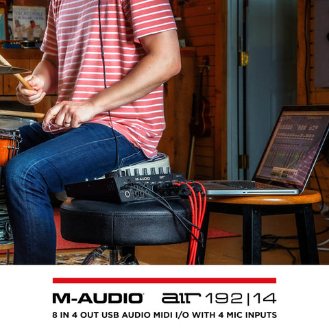 Person using USB C Audio Interface For Studio Recording With 8 Inputs And 4 Outputs MIDI In Out 24 Bit 192 KHz on laptop