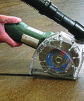 Universal Dust Shroud For Grinders 4 And 5 Inch With Diamond Blade Captures Up To 99 Percent Of Dust in use, showing clear window attachment.