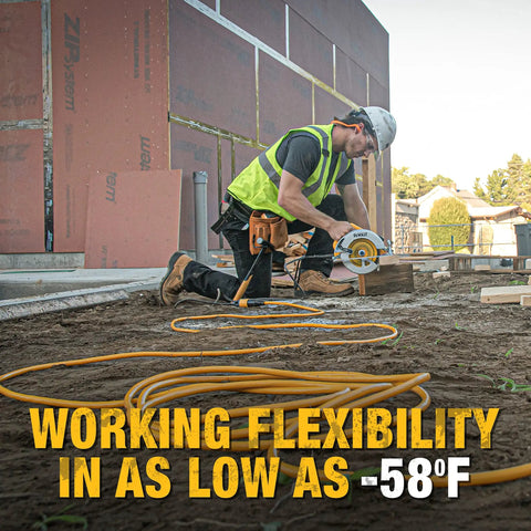 Worker using 100 Foot Lighted Extension Cord With Click-To-Lock 12/3 SJTW Heavy-Duty Outdoor Weatherproof Power Cable on construction site