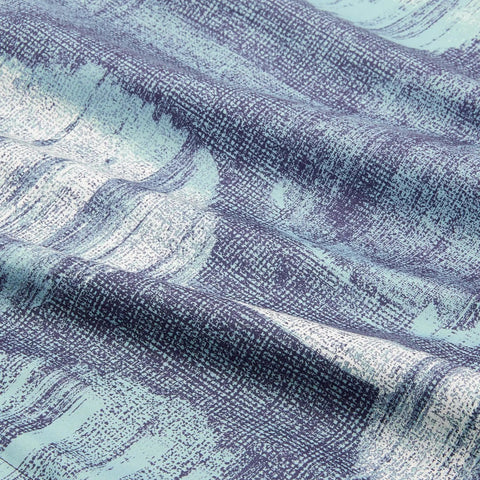 Close-up view of navy geometric print fabric from King Size Lightweight Microfiber Comforter Set With Navy Geometric Print Seven Piece Bedding Ensemble.