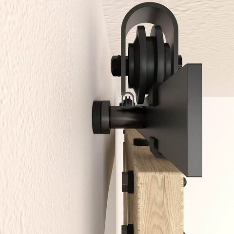 Side view close-up of 6.6FT Barn Door Hardware Kit with Heavy Duty Modular Sliding Track, J Shaped Carbon Steel System installation