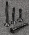 250pcs #8 x 1-1/4 Inch Flat Head Self Tapping Sheet Metal Screws Black Stainless Steel displayed on gray surface