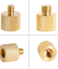Close-up of brass screw from 26 Piece Camera Screws Mount Set One Quarter Inch And Three Eighth Inch Threaded Converter Adapters