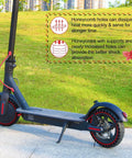 Electric scooter on grass with 2PCS 8.5x2 inches Solid Tires for Electric Scooter, honeycomb holes visible for heat dissipation.