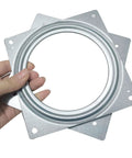Person holding a 6 Pack 6 Inch Square Lazy Susan Hardware, Heavy Duty Zinc Plated Steel Turntable Bearings with Smooth 360 Rotation.