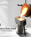 Precision casting process with molten metal, showcasing heavy-duty load emblem indicating 220lb capacity.
