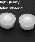Close-up of two nylon ball transfer units for furniture, showcasing high-quality material, part of 10 Pcs Nylon Ball Transfer Units Roller Ball Bearings.