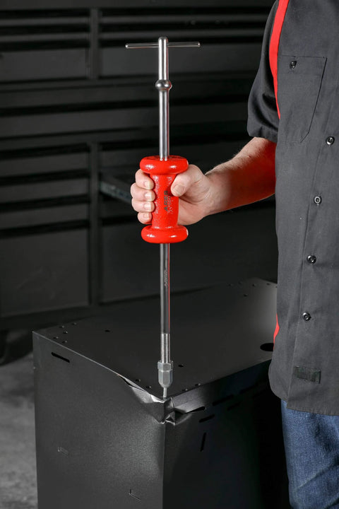 Man using Master Slide Hammer Puller Set - 10-Way Slide Hammer Puller Set Includes 3-Piece Rear Axle Bearing Puller Kit