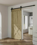 Interior view with 6.6FT sliding barn door hardware kit for single door, carbon steel black track, installed in an open position.