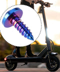 Close-up of ✝️ Briny River 4Pcs Titanium Screws M5x15mm Torx Head Self Tapping Screw for Motorcycle Bicycle, Burn Blue, over scooter.
