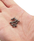 Hand holding 26Pcs Titanium Alloy Torx Screw Set Compatible with Benchmade 535 BUGOUT Knife (Titanium)