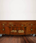 Wood cabinet with 2 Inch Heavy Duty All Steel Swivel Plate Caster Wheels Set of 4 installed, showing wheel capacity markings.