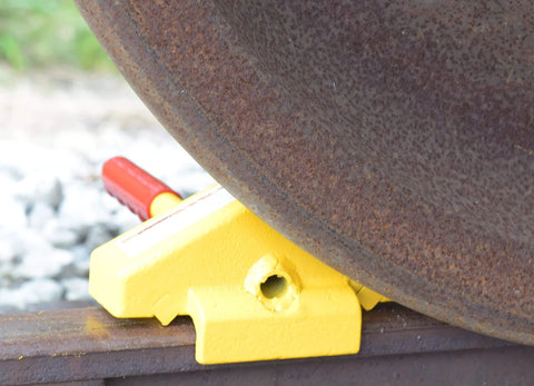 Steel Single Rail Chock With Handle For Keeping Railroad Cars From Moving All Welded Steel Construction Bright Yellow Finish